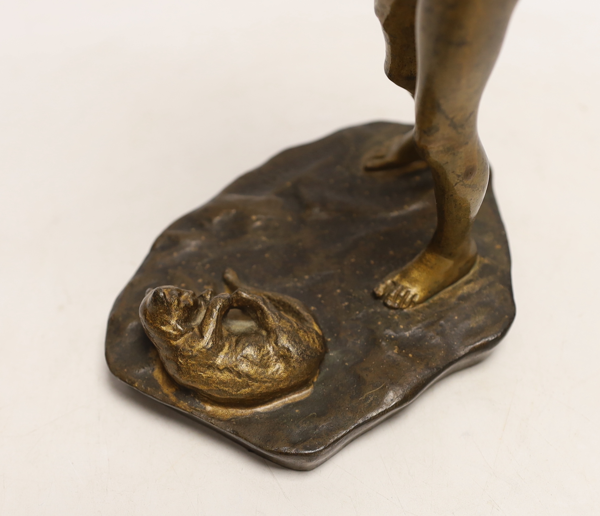 A Ferdinand Frick (1878-1939) for Goldscheider, bronze study of a girl with a cat, signed, 24cm high